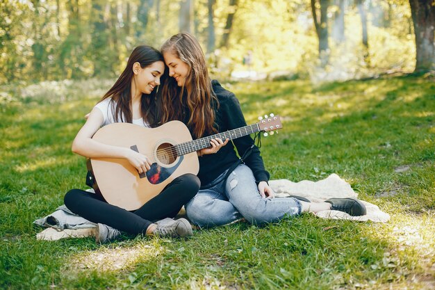 Two girls with a guitar