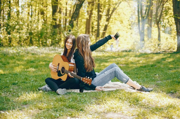 Two girls with a guitar