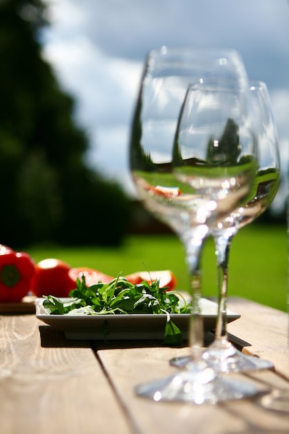 Two glasses of water on table