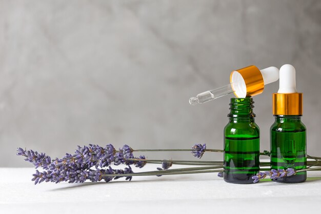 Free Photo | Top view glass bottle and lavender