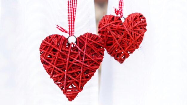 Two hand made red hearts. Wedding