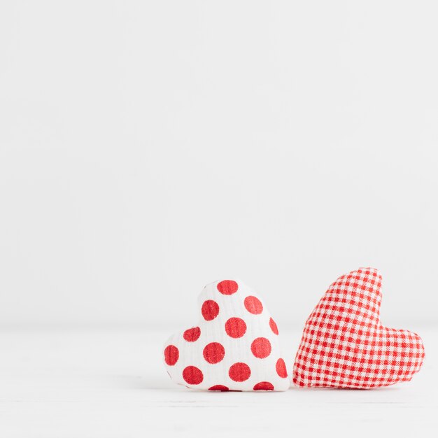 Two handmade heart shaped toys