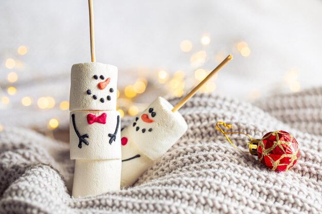 Two happy funny marshmallow snowmen christmas winter holiday decoration