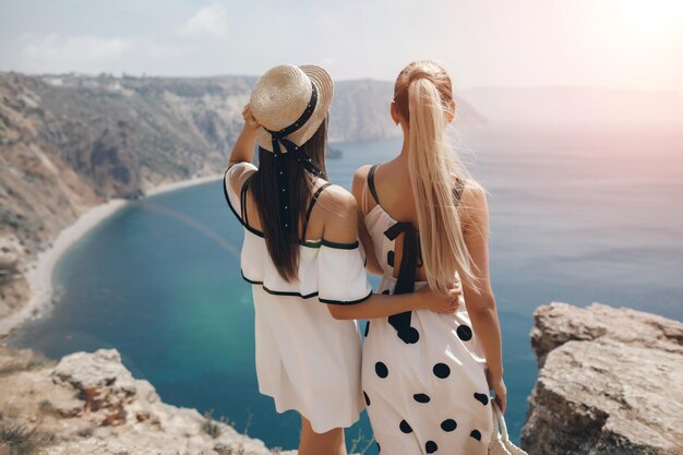 Two happy sisters outdoors