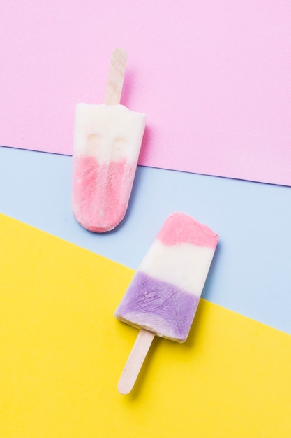 Two ice cream on stick