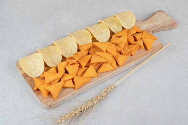 Two kinds of chips on wooden board