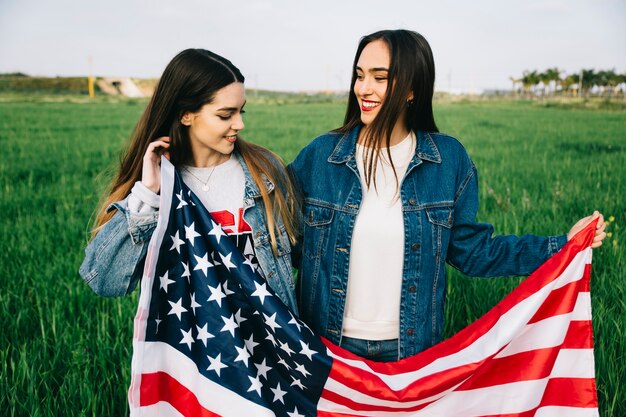 Two ladies in jeans jackets 