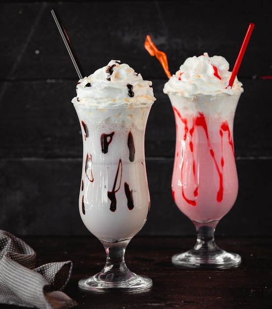 two milkshakes with chocolate and strawberry