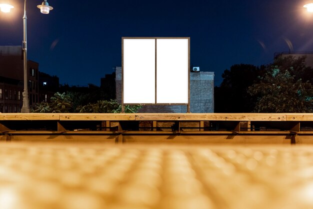 Two mock-up billboards on a bridge