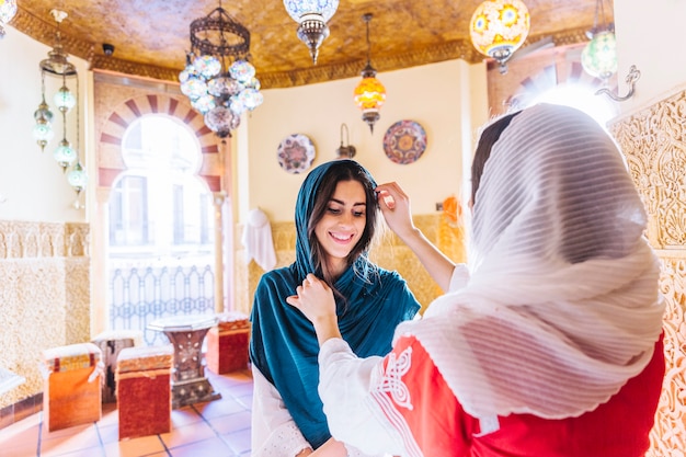 Free photo two muslim women in restaurant