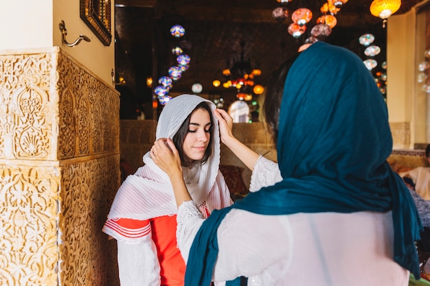 Free Photo two muslim women in street