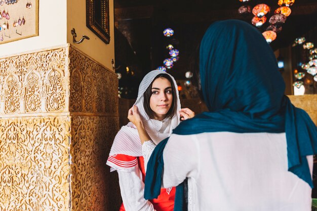 Free Photo two muslim women in street