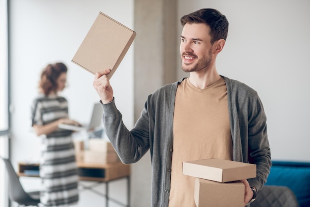 Two online shop employees handling their daily tasks