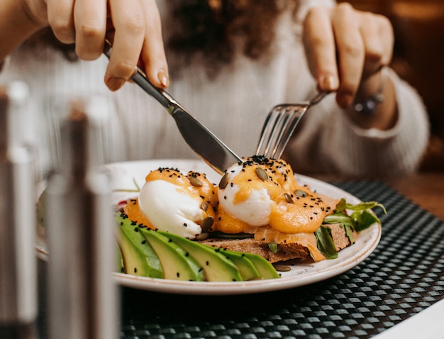 Two pachot eggs above the bread  