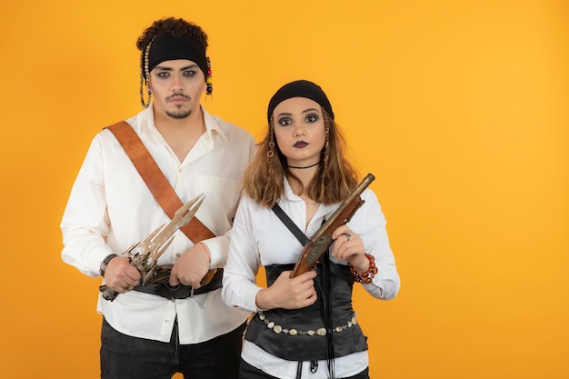 Free photo 'two pirates holding guns and looking at camera. high quality photo