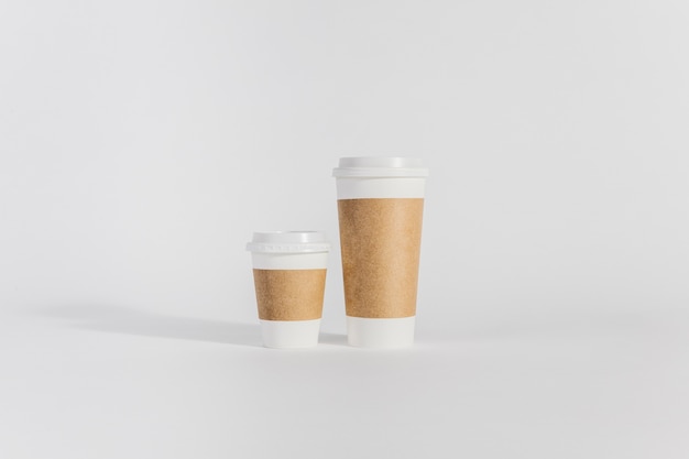 Two plastic cups of different sizes