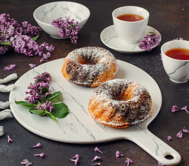 two portioned cacao marble cakes on marble board