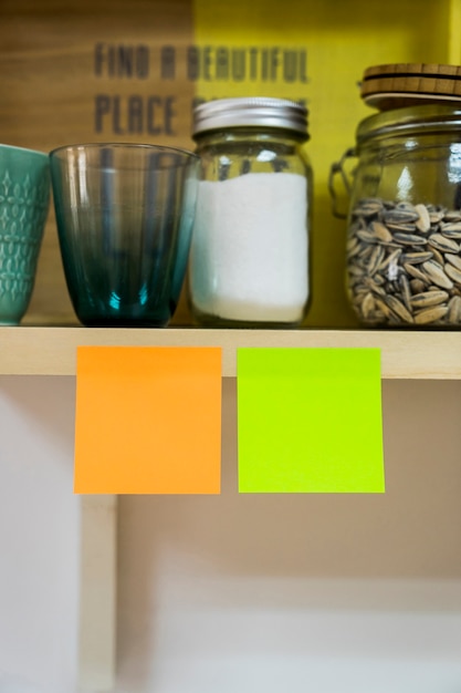 Free photo two post its in kitchen