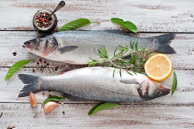 Two raw seabass with spices 