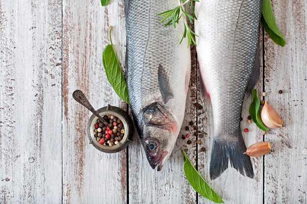 Two raw seabass with spices