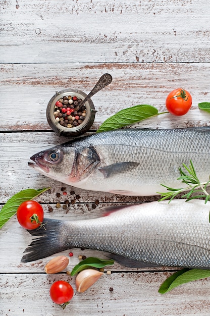 Two raw seabass with spices