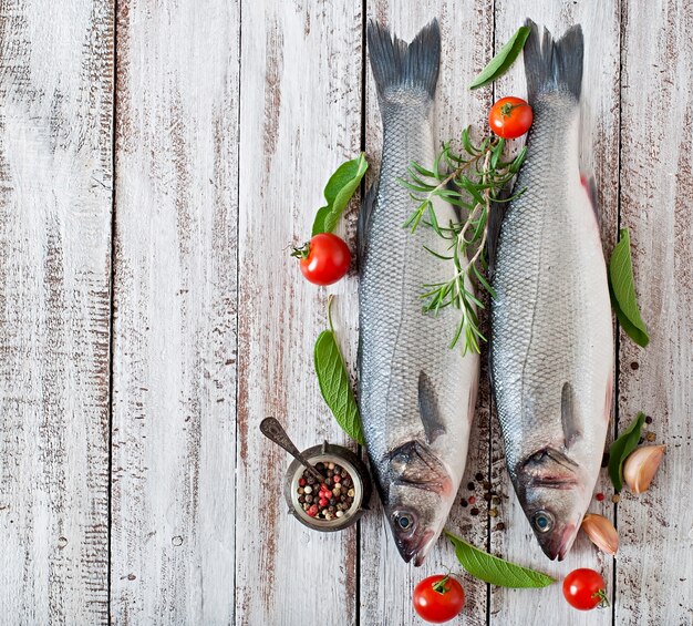 Two raw seabass with spices 