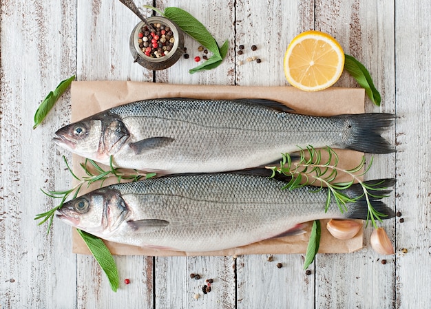 Two raw seabass with spices 