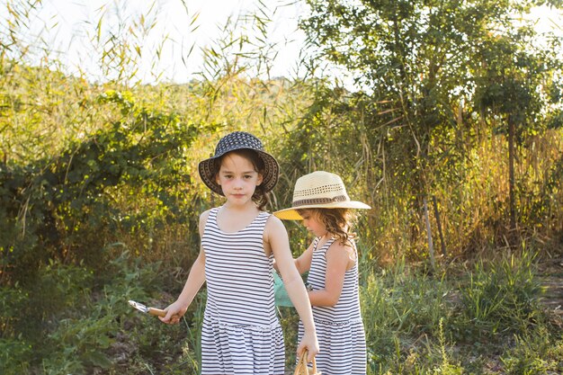 Two sister working in the field