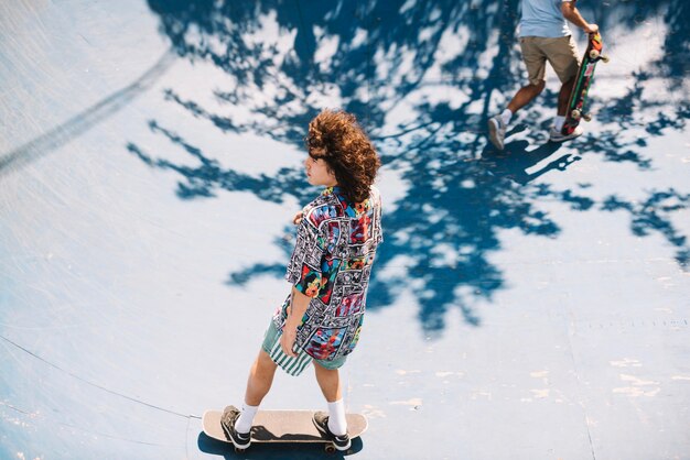 Two skateboarders on ramp