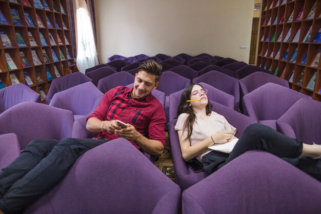 Two students in library hall