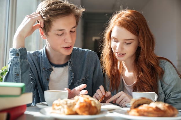 Two students making lessons