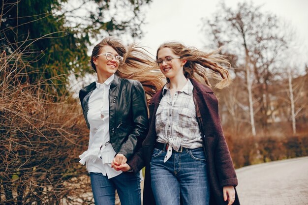 two stylish girl in a city