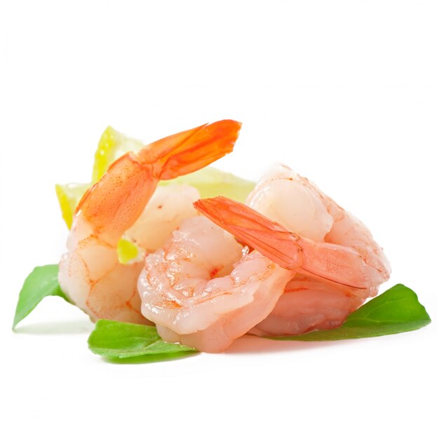 Two tail of shrimp with fresh lemon and rosemary on the white