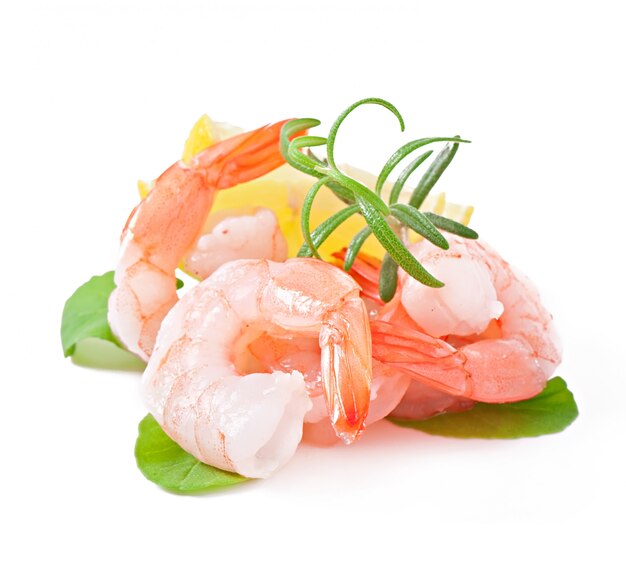 Two tail of shrimp with fresh lemon and rosemary on the white