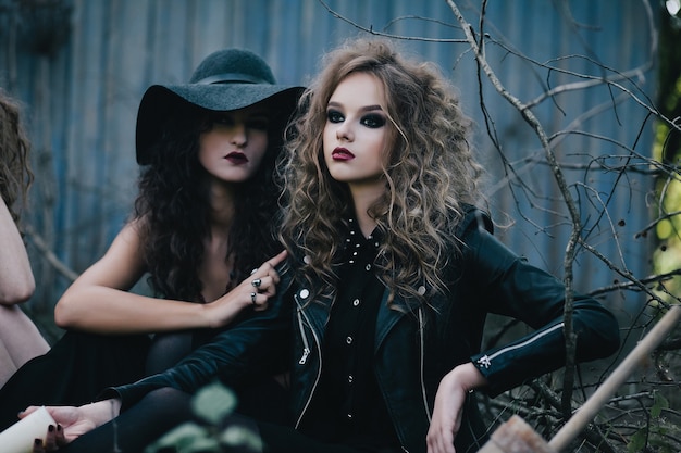 Two vintage witches gathered for the sabbat eve of Halloween