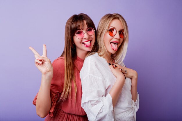 Two woman in spring dress posing