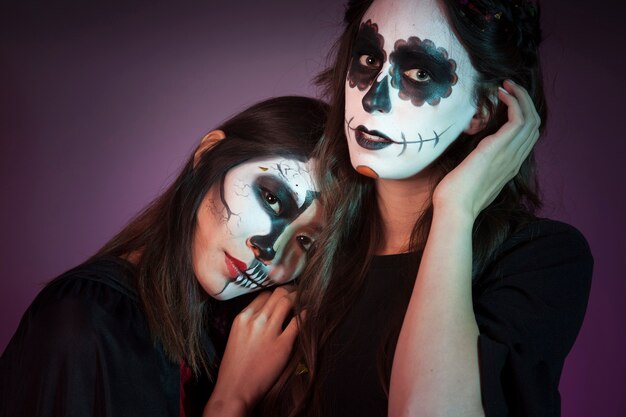 Two women dressed as witches