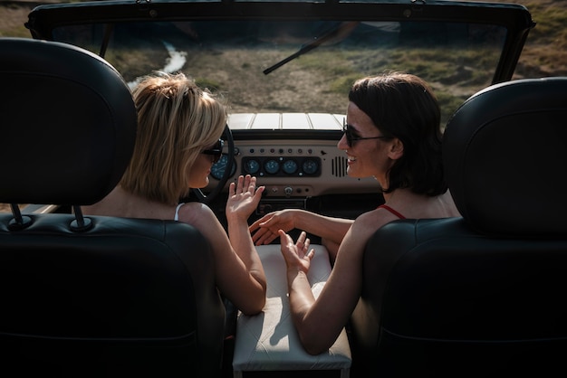 Two women traveling together by car