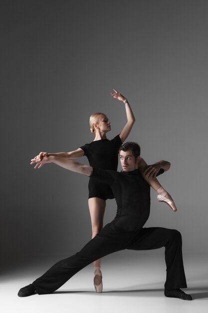 Two young modern ballet dancers