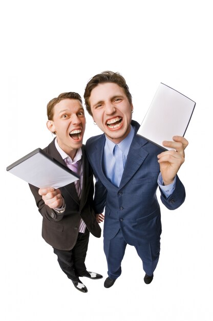 Two young people offering DVDs for sale