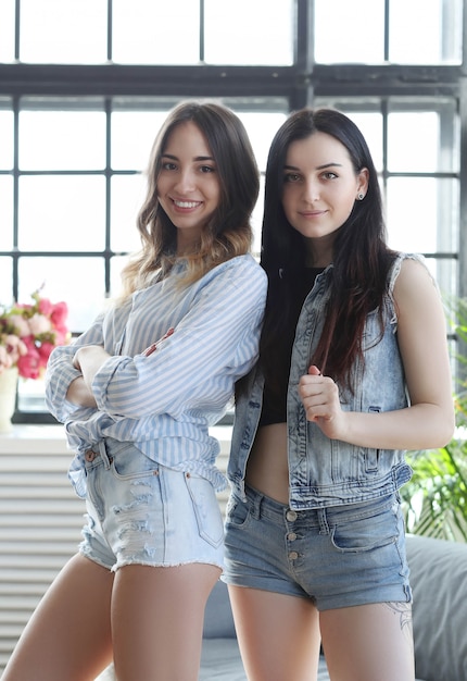 Free photo two young women hanging out together