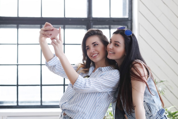 Two young women hanging out together