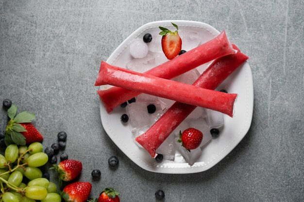 Typical brazilian freezies with fruits still life