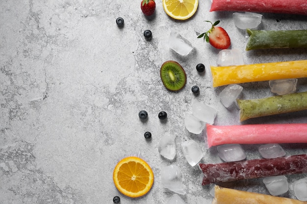 Free photo typical brazilian freezies with fruits still life