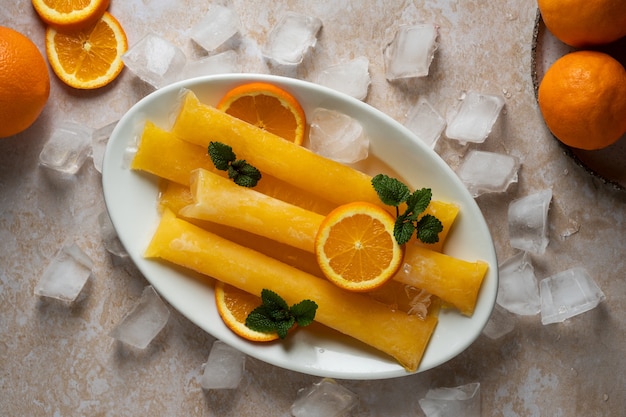 Free photo typical brazilian freezies with fruits still life