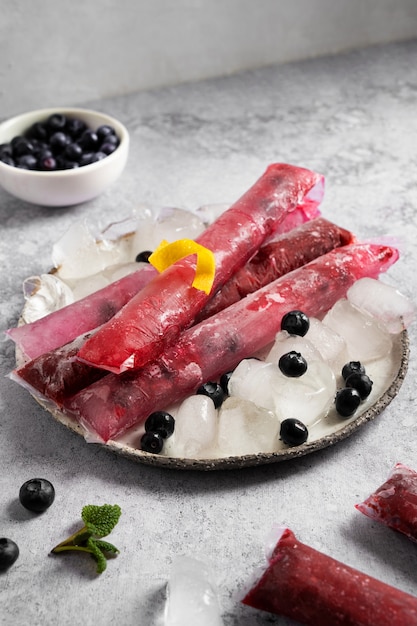 Free photo typical brazilian freezies with fruits still life