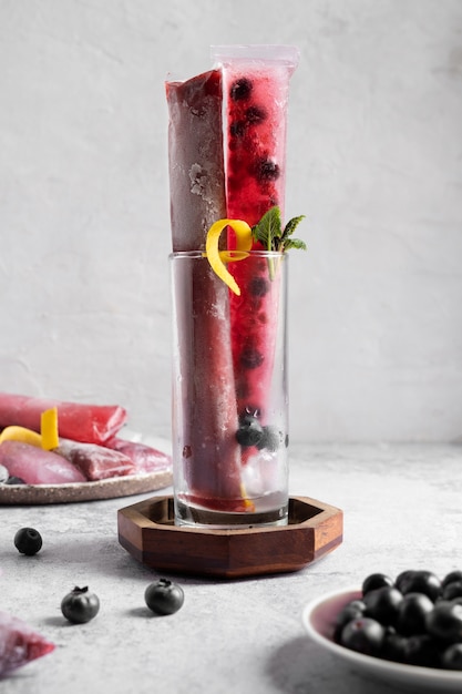 Free photo typical brazilian freezies with fruits still life