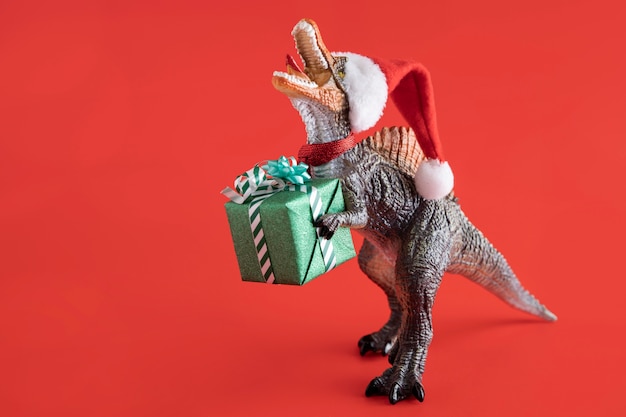 Tyrannosaurus rex holding present box