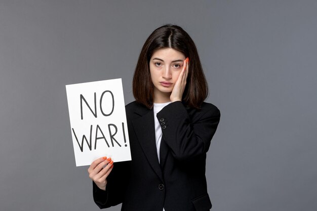 Ukraine russian conflict pretty lovely dark hair woman in black blazer covering face