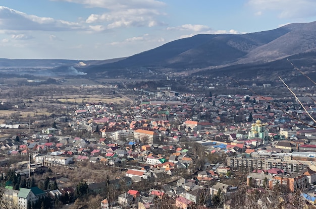 Ukrainian town near mountains landscape in the sunny day
